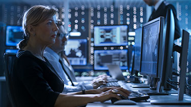 woman working on desktop computer