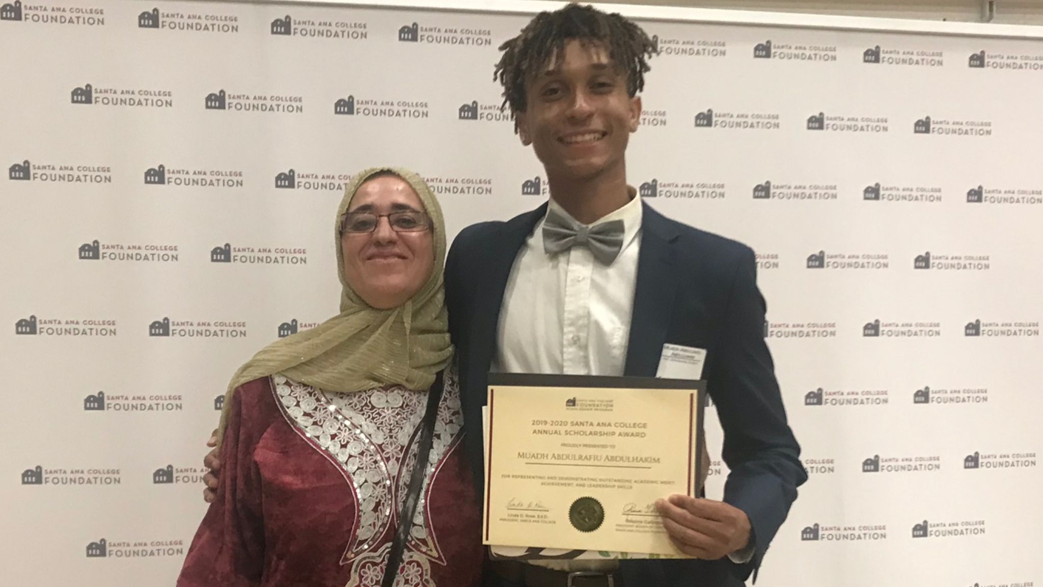 SAC Student Athlete and Scholarship Recipient Muahd Abdul Hakim and his mother.jpeg